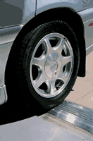 A car tire, featuring a robust rubber tread